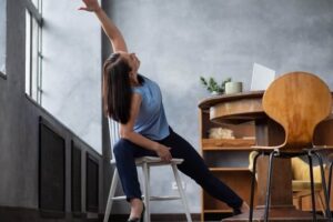 8 Yoga Poses You Can Do in Your Desk Chair